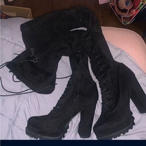 Woman thigh high boots